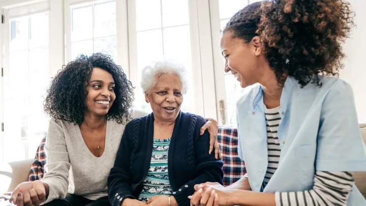 3 people smiling together